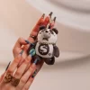 PORTACHIAVI CON MASCHERA DA SCI PANDA E ORSO